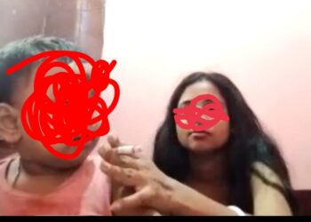 পার্টিতে ২০ মাসের শিশু সন্তানের মুখে মদ- সিগারেট দিলেন মা !